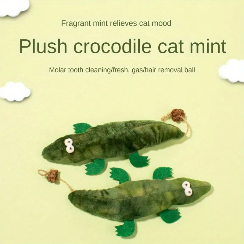 Green plush alligator-shaped cat toy with plant-based catnip and peppermint scent
