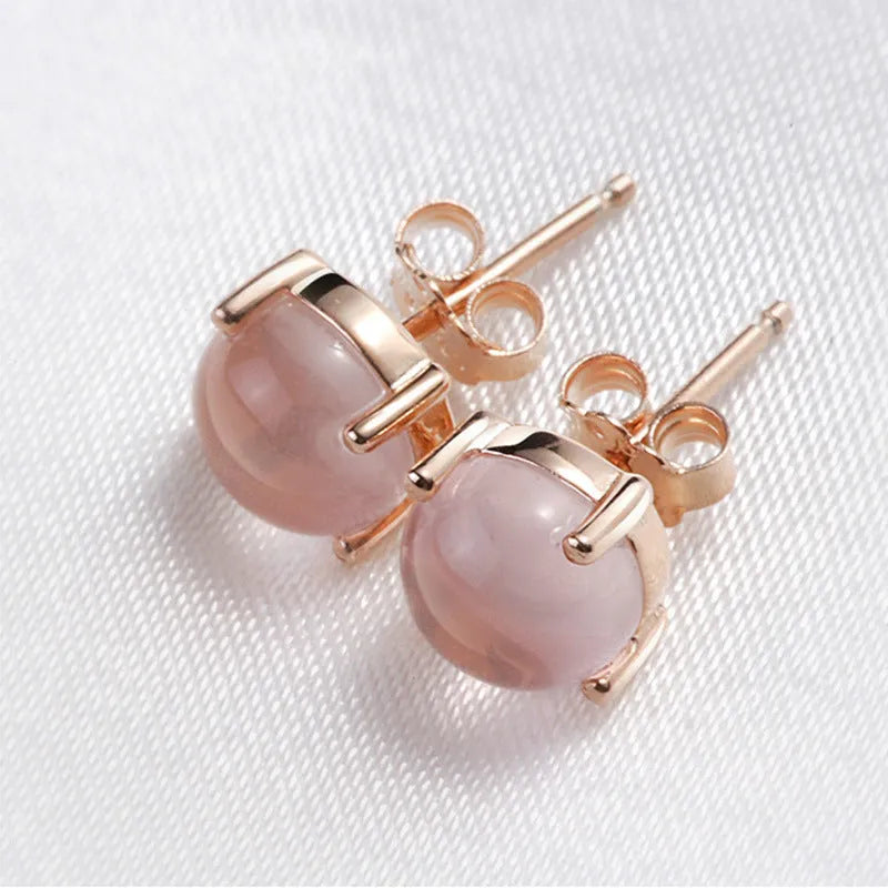 Women's rose gold drop stud earrings with synthetic quartz crystal inlay, Korean minimal style.