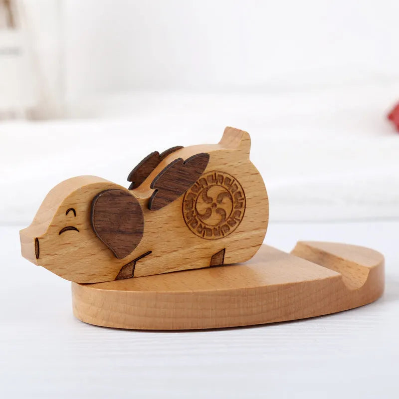 Resin mobile phone holder with beech wood animal design and coin storage compartment