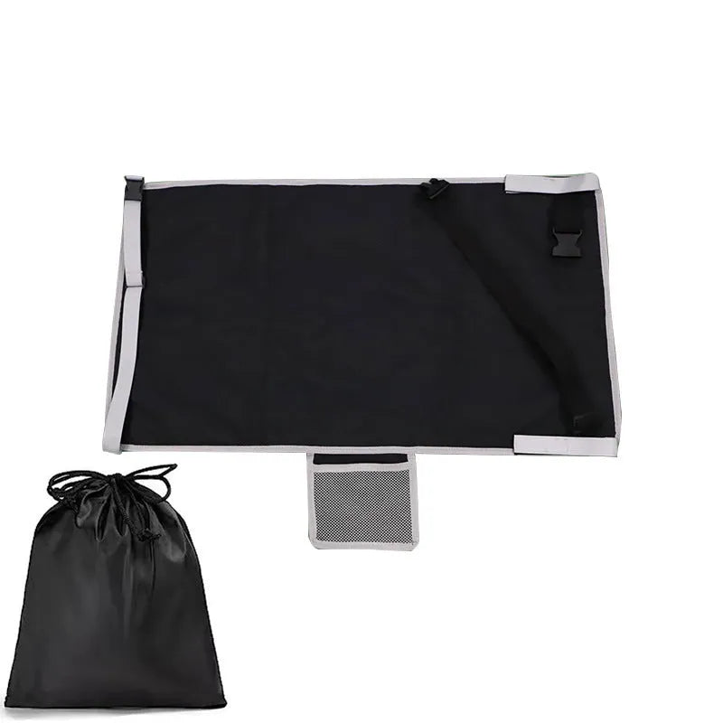 Portable blue children's aircraft seat extender with adjustable pedal device and matching drawstring pocket.