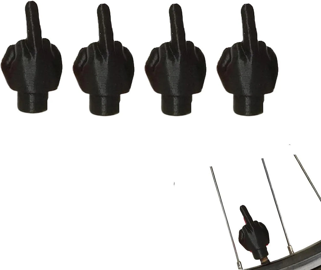 Four latex car tyre valve dust cover caps in black and skin colours