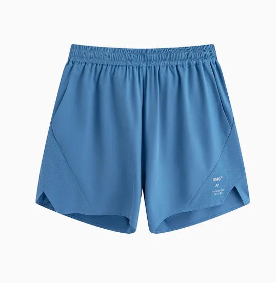 Black and blue four-point stretch running shorts with laser-cut stitching detail on a mannequin.