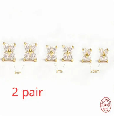 S925 sterling silver stud earrings with a geometric petal crystal flower design in gold or platinum finish.