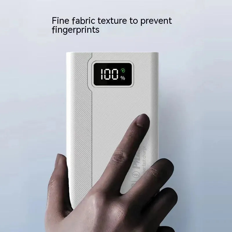 Large capacity black or white plastic power bank with fast charging support.