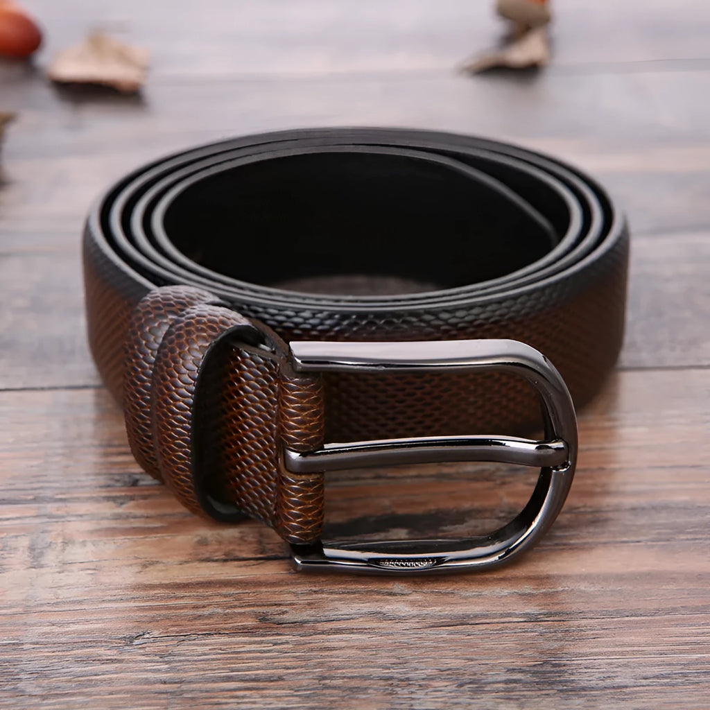 Men's business belt showing laser pattern detail with alloy pin buckle on imitation leather strap