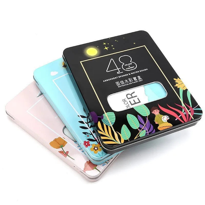 Boxed set of 48 solid watercolour paint tablets including Black Knight, Girl Pink, and Sunshine Blue colours.