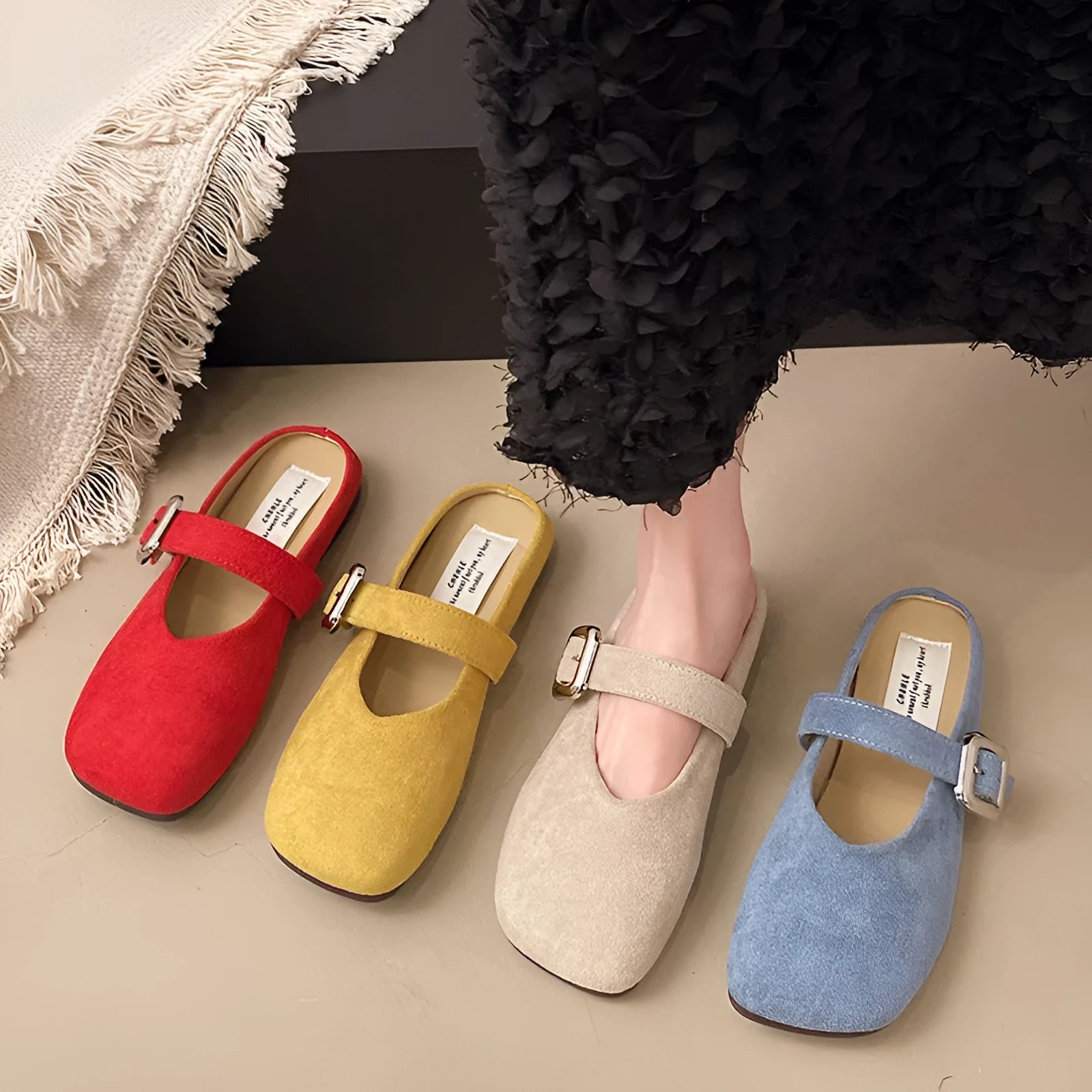 Women's flat closed toe half slippers in square head design with PU upper and rubber sole