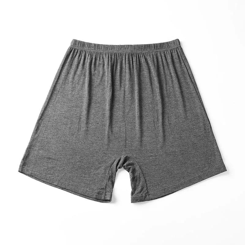 Men's solid colour high-waist boxer shorts made from modal fabric, shown in black, on a white background.