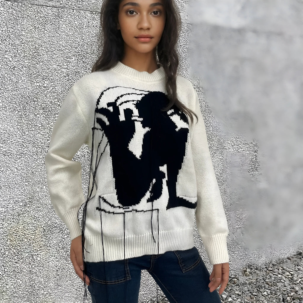 Grey alpaca wool women's sweater with tassel detail and abstract pattern