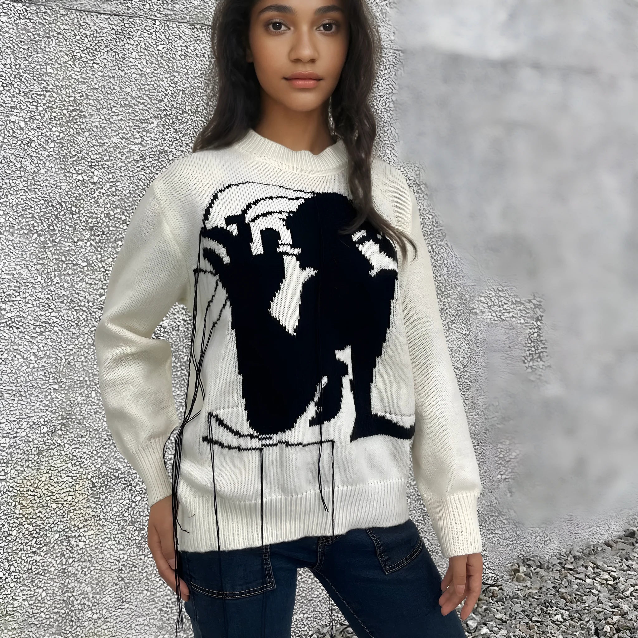 Grey alpaca wool women's sweater with tassel detail and abstract pattern