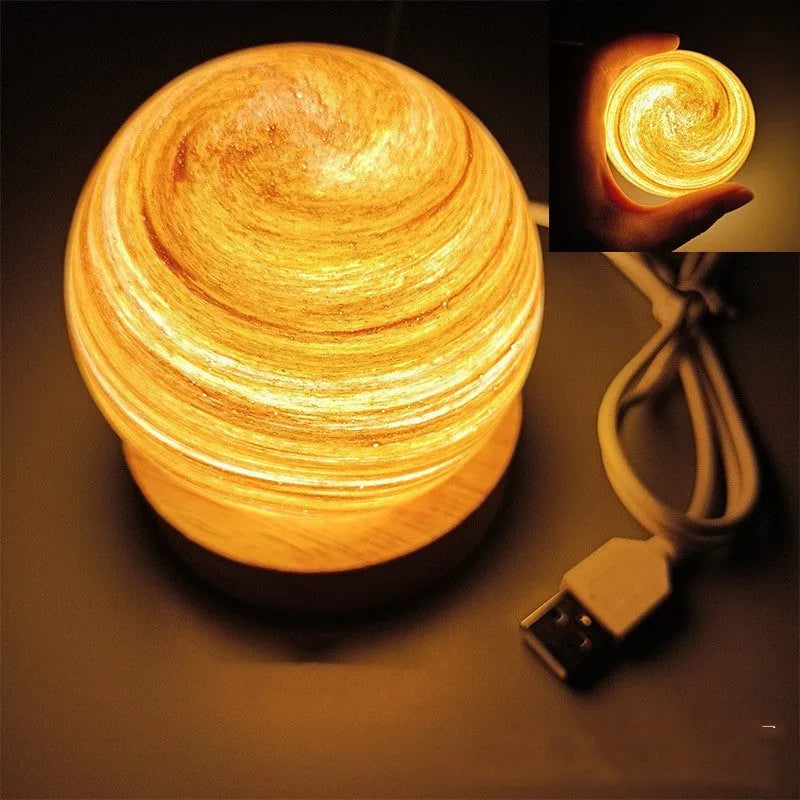 Planet-themed USB plug-in night light with three-colour dimming on a base, showing 80x90mm size.