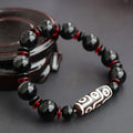 Black agate Dzi bead bracelet with 11mm geometry-shaped stones and hand-woven construction