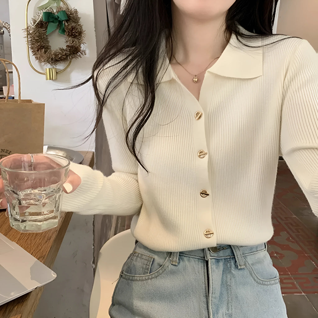 Loose fit beige viscose knitted cardigan with long sleeves, shown worn open.