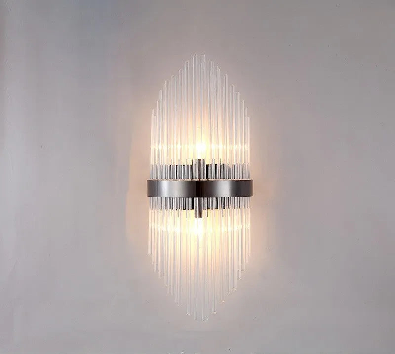 Modern crystal wall lamp with petal design in titanium gold finish