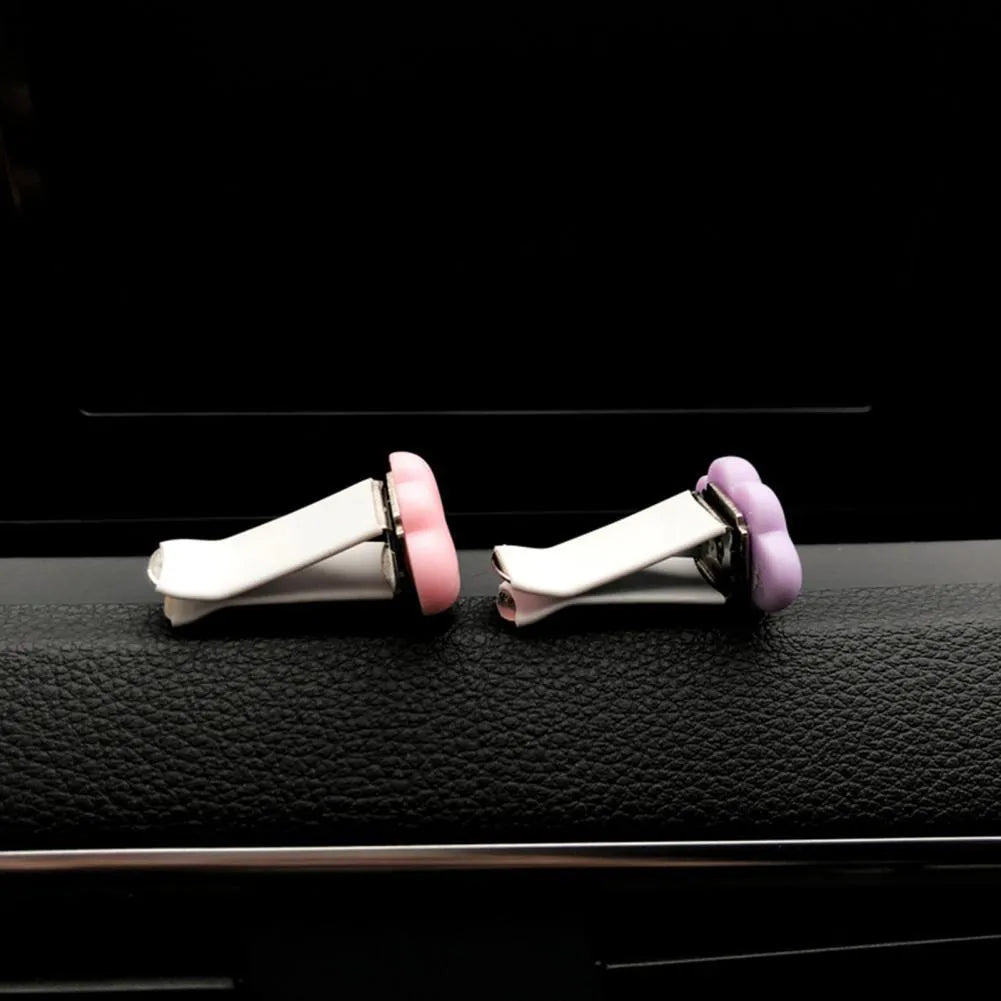 Resin Baiyun cartoon car fragrance clip in six colours for dashboard or vent mounting