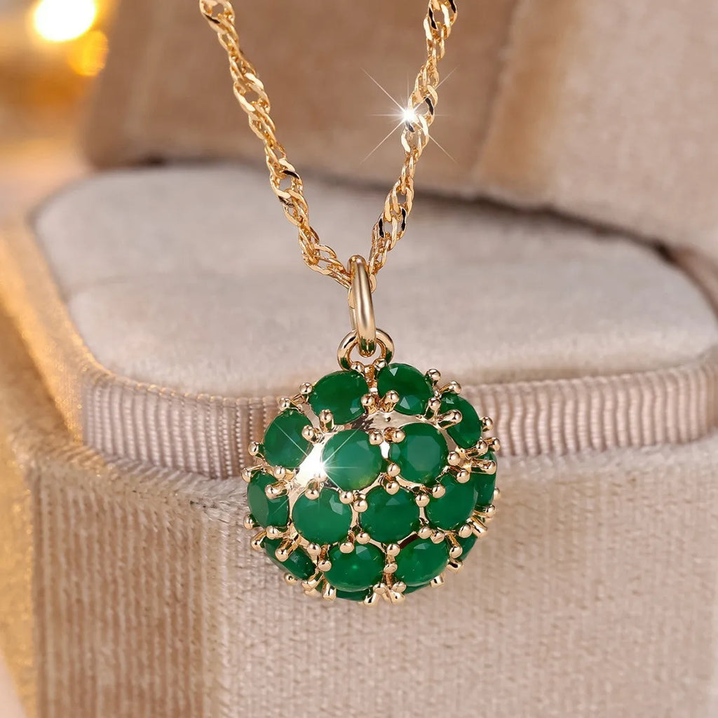 Round emerald and diamond necklace with champagne gold finish and adjustable chain