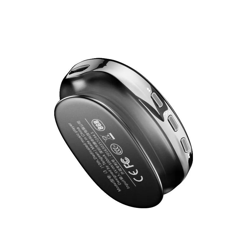 Compact blue Bluetooth MP4 music player with OLED screen showing track info.