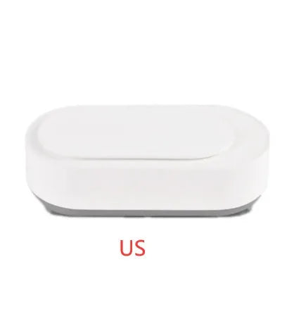 White portable ultrasonic cleaning machine with stainless steel tank for jewellery and glasses.