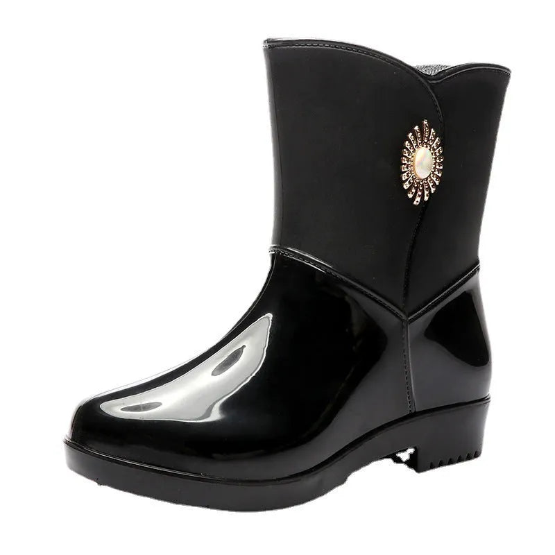 Women's purple PVC rain boots with non-slip sole and middle tube design