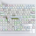 Complete PBT keycap set with cat and puppy illustrations for mechanical keyboards