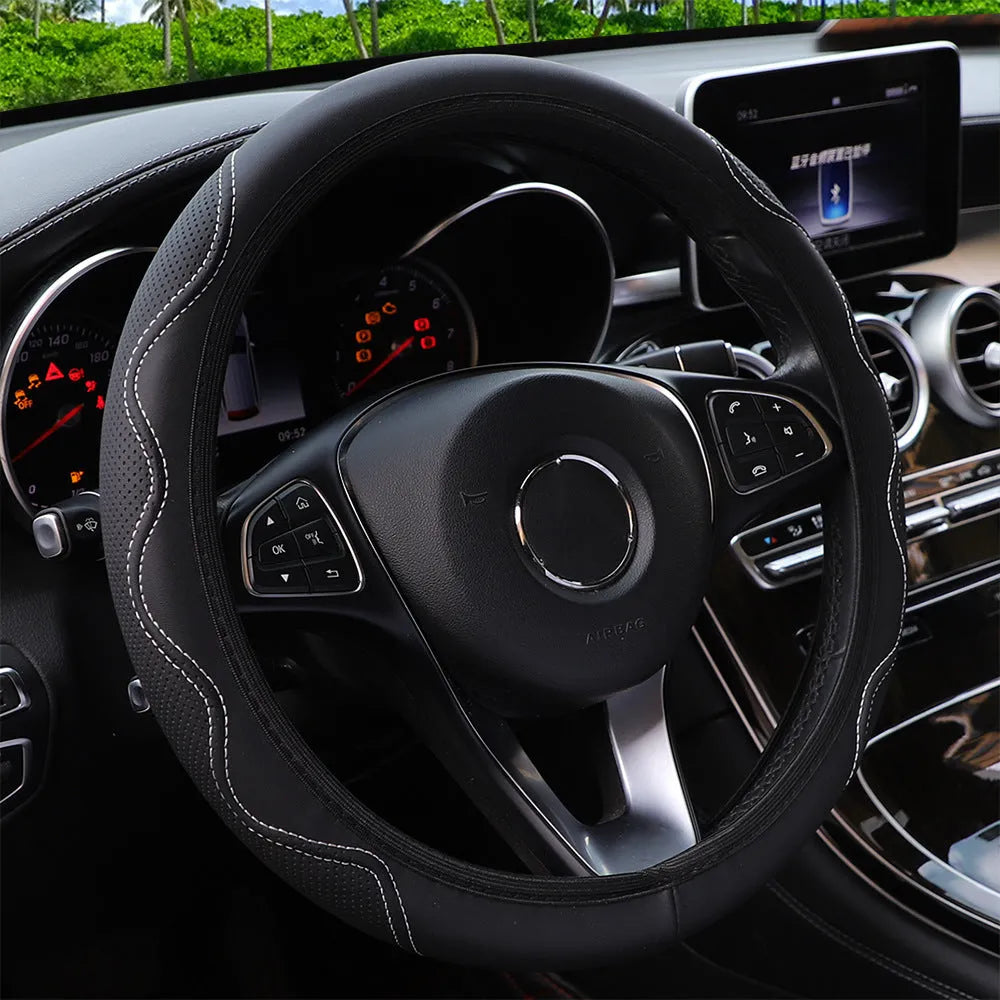 Elastic embossed corrugated PU leather steering wheel cover for 37-38cm diameter wheels in multiple colours.