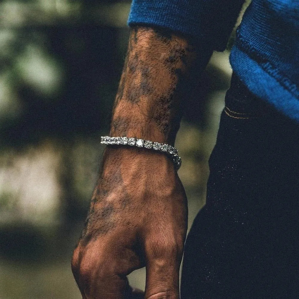 Men's geometric chain link hip hop bracelet with single row of iced out zirconia rhinestones.