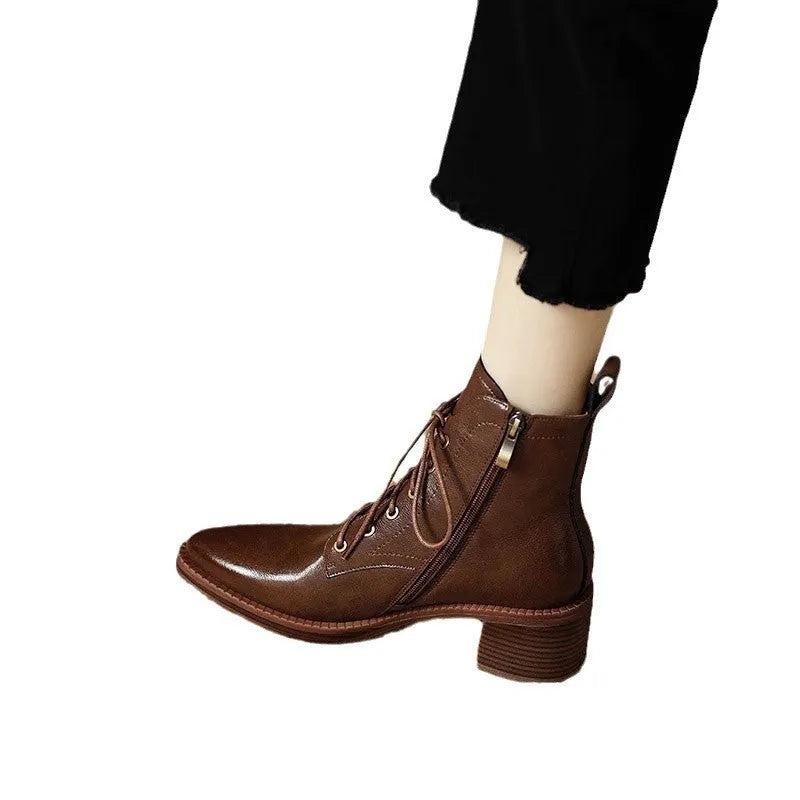 Women's black pointed-toe ankle boots with 5.5cm heel and 13cm shaft