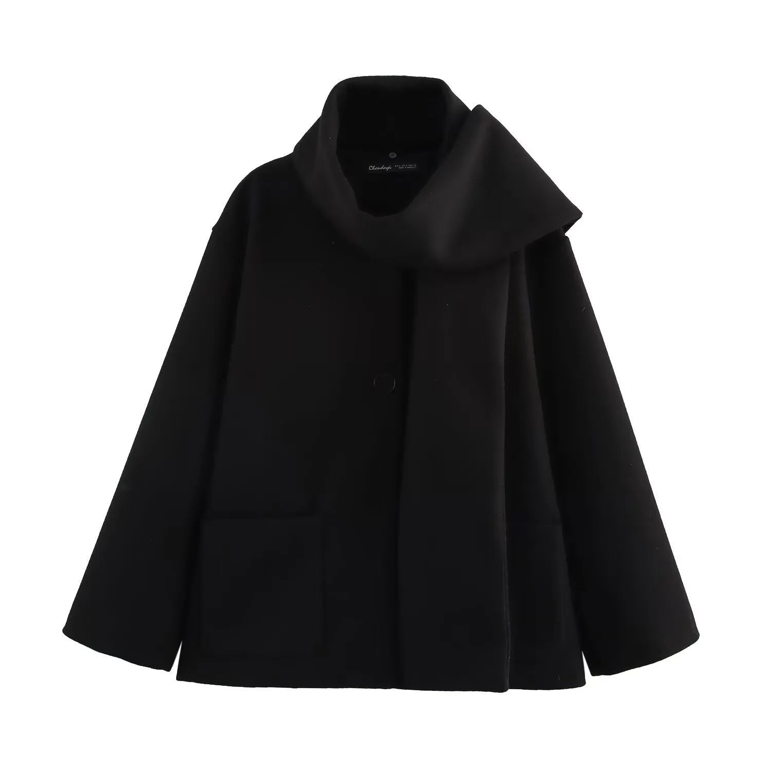 Women's long grey wool blend overcoat with a large artificial fur collar and pockets.