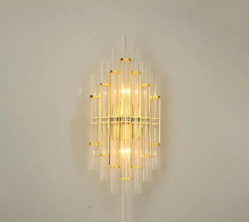 Modern crystal wall lamp with petal design in titanium gold finish