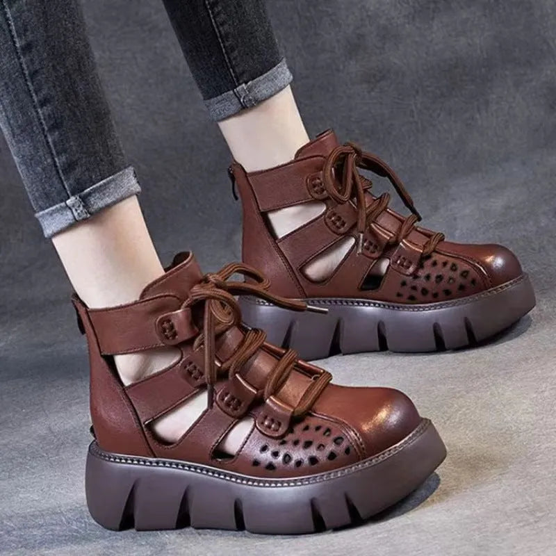 Women's black plush leather platform sandals with fish mouth toe and hollow hole design on a PU sole.