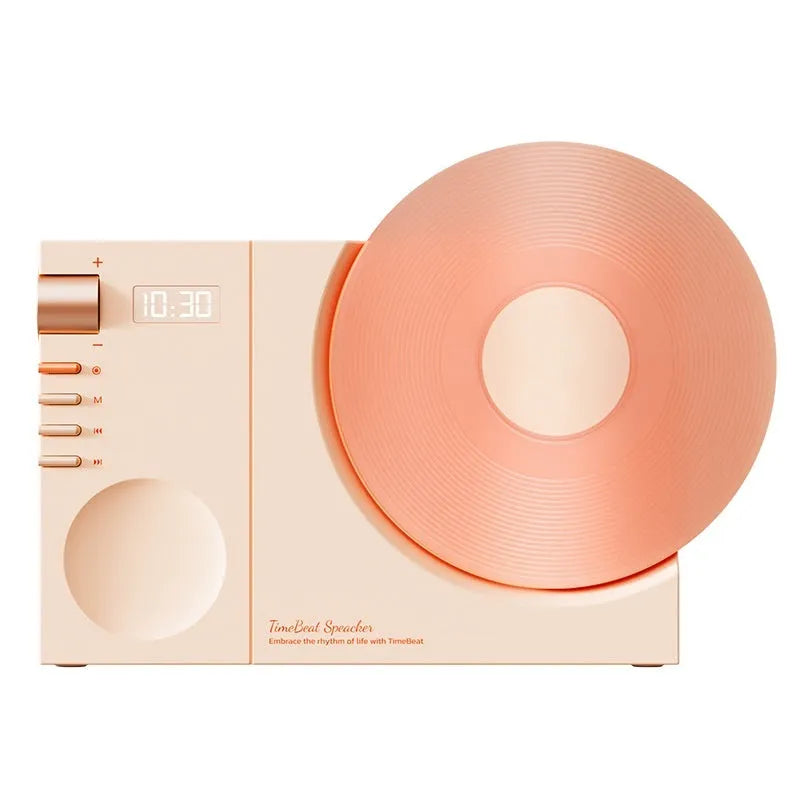 Mini Bluetooth speaker in Coral Pink colour with USB charging port and control buttons