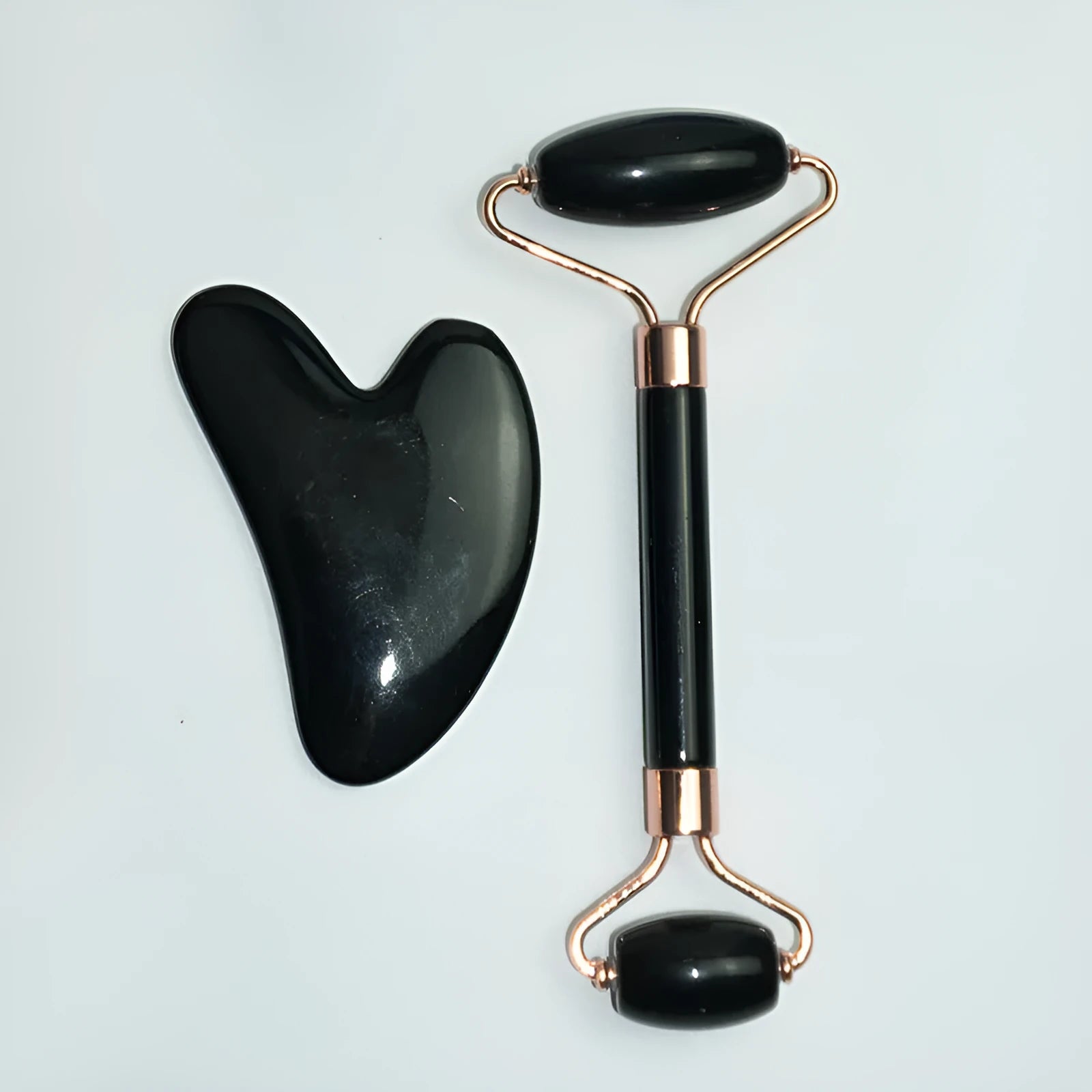 Stainless steel facial massage board set with heart-shaped eye tool and double-head roller