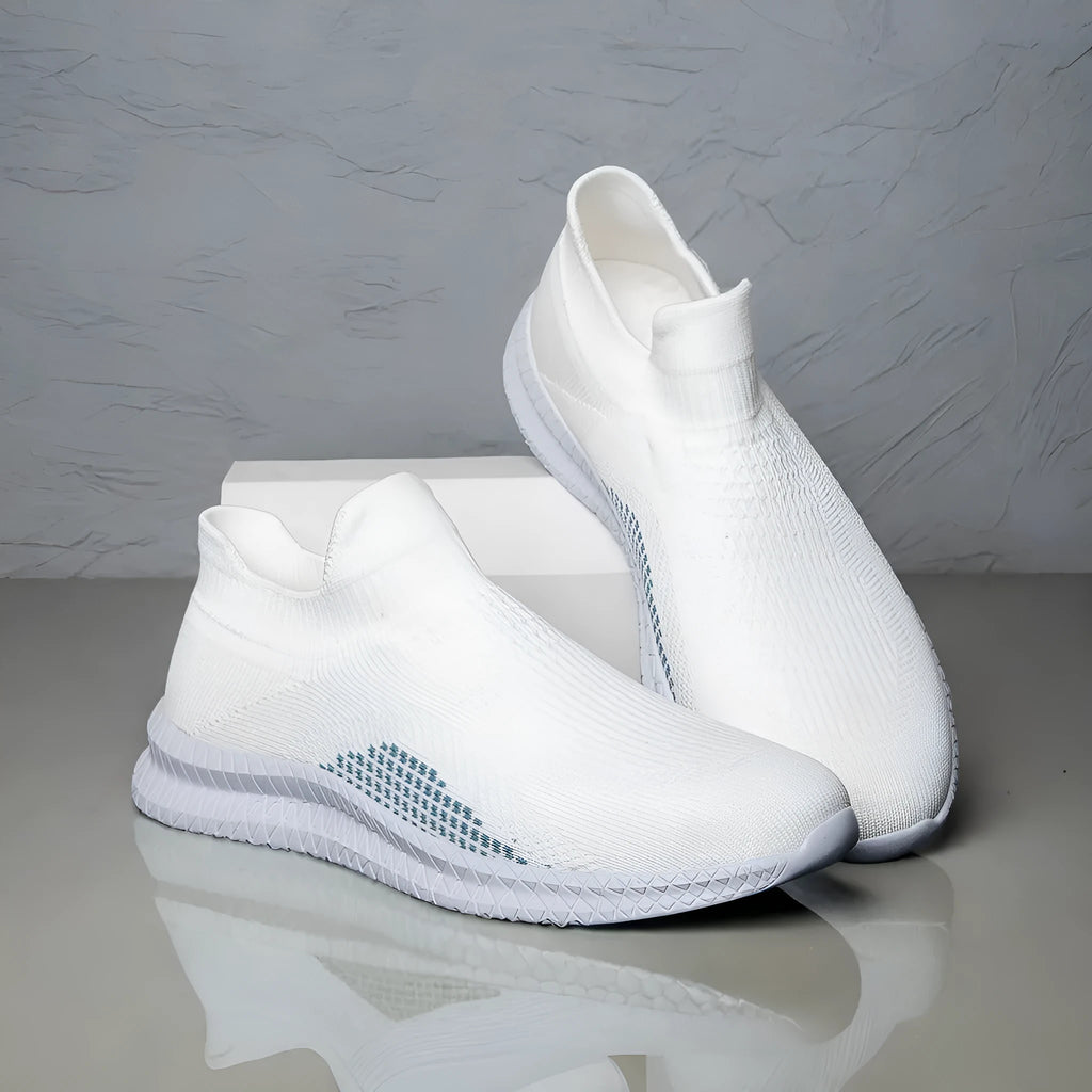 Men's solid colour casual sneakers with fabric upper and low-top design on a white background.