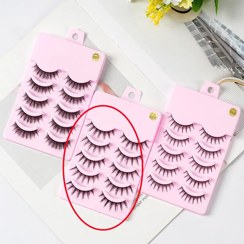 Five pairs of natural wispy false eyelashes on a card for manga anime cosplay and Korean style makeup.