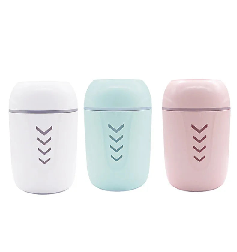 Portable columnar car humidifier with mechanical controls and USB cable in blue colour