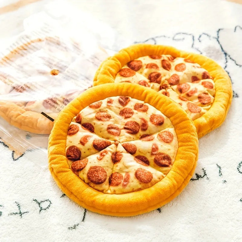 Yellow pizza slice shaped plush dog chewing toy with a squeaker for medium and small dogs.