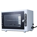 Small silver ultraviolet sterilizer with stainless steel interior for salon tool disinfection