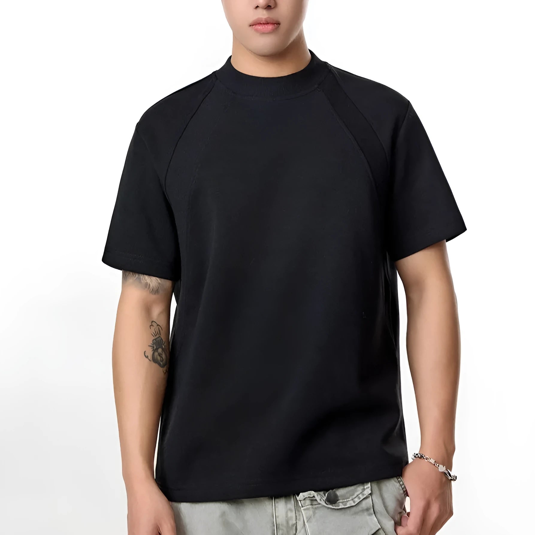 Men's black short sleeve top with air layer stitching detail, loose fit design
