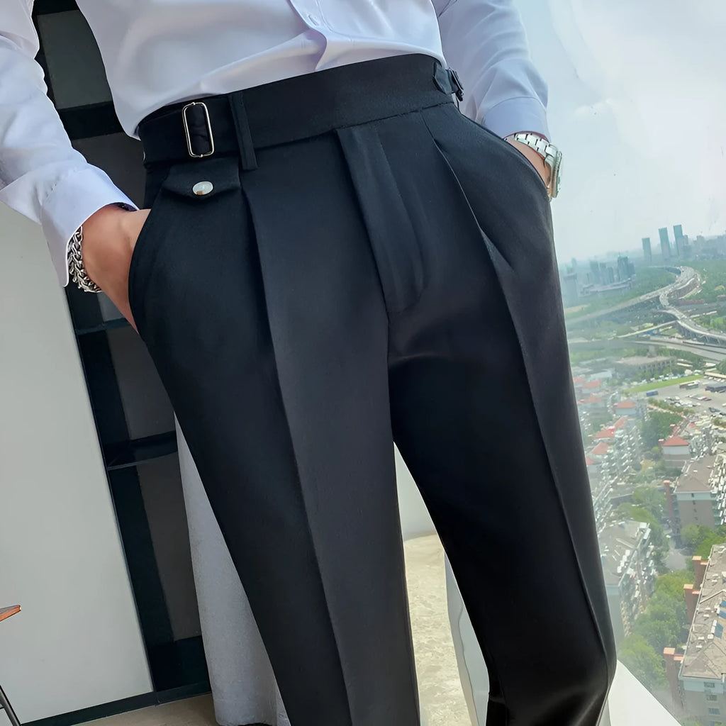 Men's straight leg casual trousers in solid colours including black and grey on a hanger.