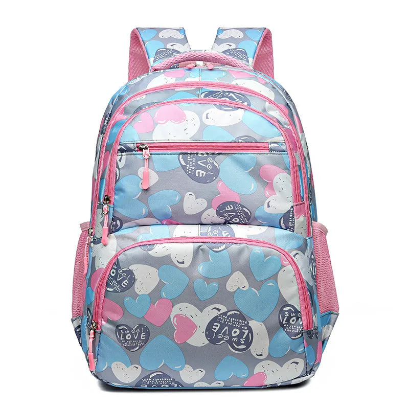 Blue children's school backpack with air pillow shoulder straps and Oxford cloth exterior