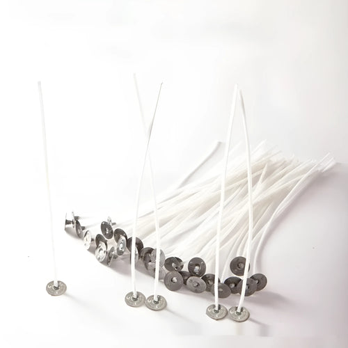 White cotton candle wicks showing three different lengths for DIY candle making projects