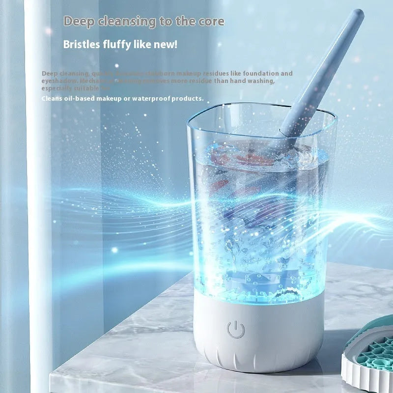 White rechargeable electric makeup brush cleaner with rotating brush head and USB cable
