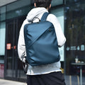 Waterproof PU leather backpack in black, blue or grey showing simple design and sewing thread detailing