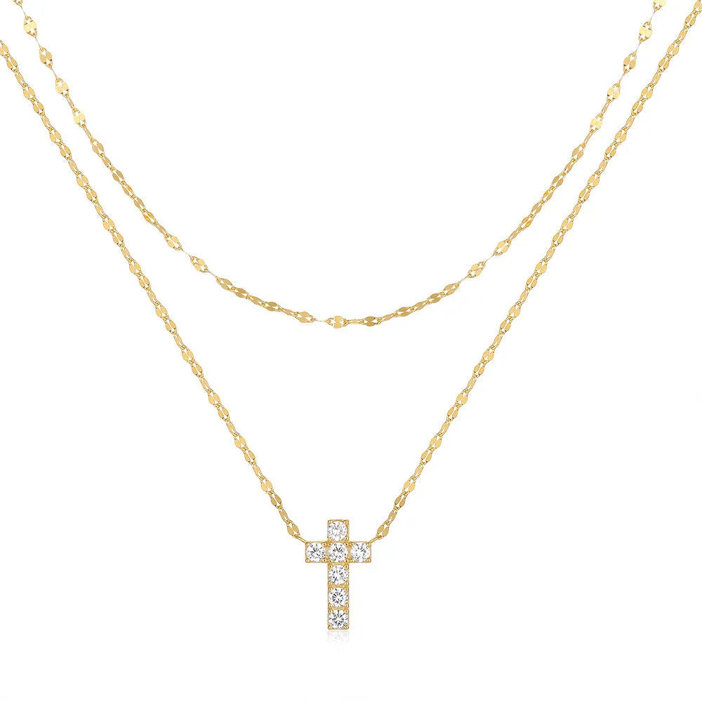 S925 sterling silver double layer cross pendant necklace with diamond accents on a clavicle chain.