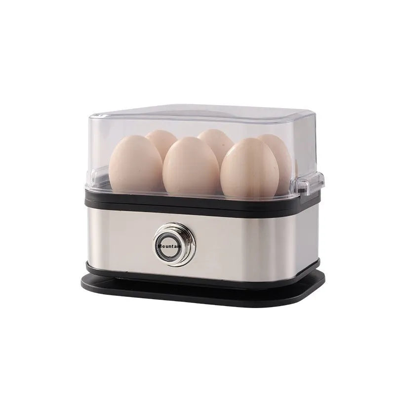 Black portable stainless steel mini egg boiler for travel with multiple power plugs.
