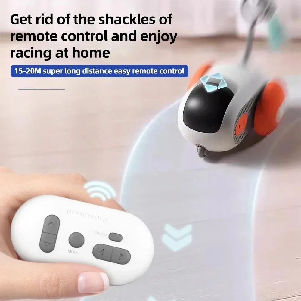 Blue remote controlled smart cat toy car with feather teaser attachment on hard floor