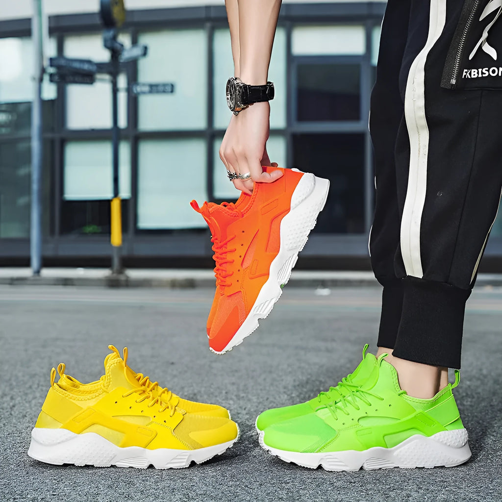 Men's green low top mesh casual shoes with lace-up front and cross shoulder straps on a flat MD sole