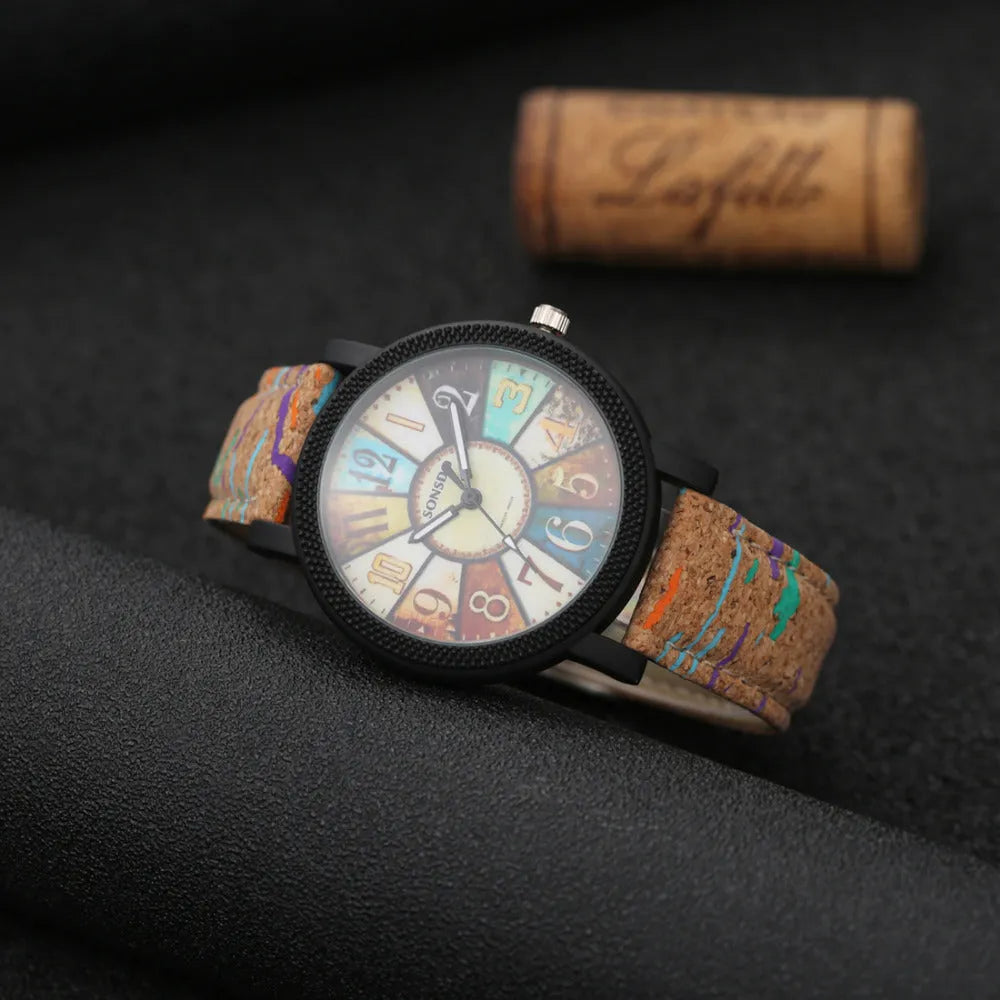 Women's vintage style quartz watch with brown leather strap and 37mm round silver dial