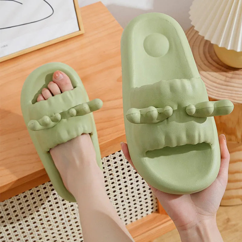 Women's deer horn design flip flop slippers in light yellow EVA material with hollow-out pattern.