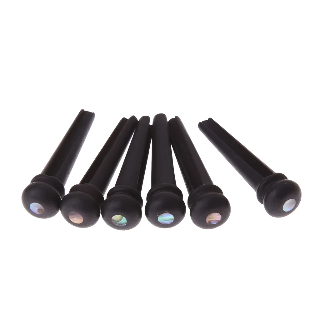 Six ebony folk guitar string nails with matt black finish for acoustic guitar bridge